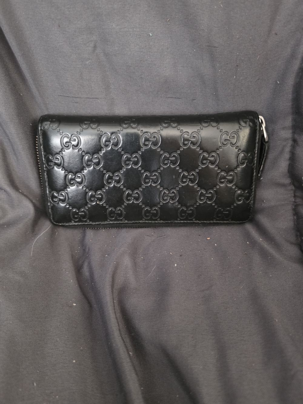 Authentic Gucci Black GG Embossed Zip Wallet